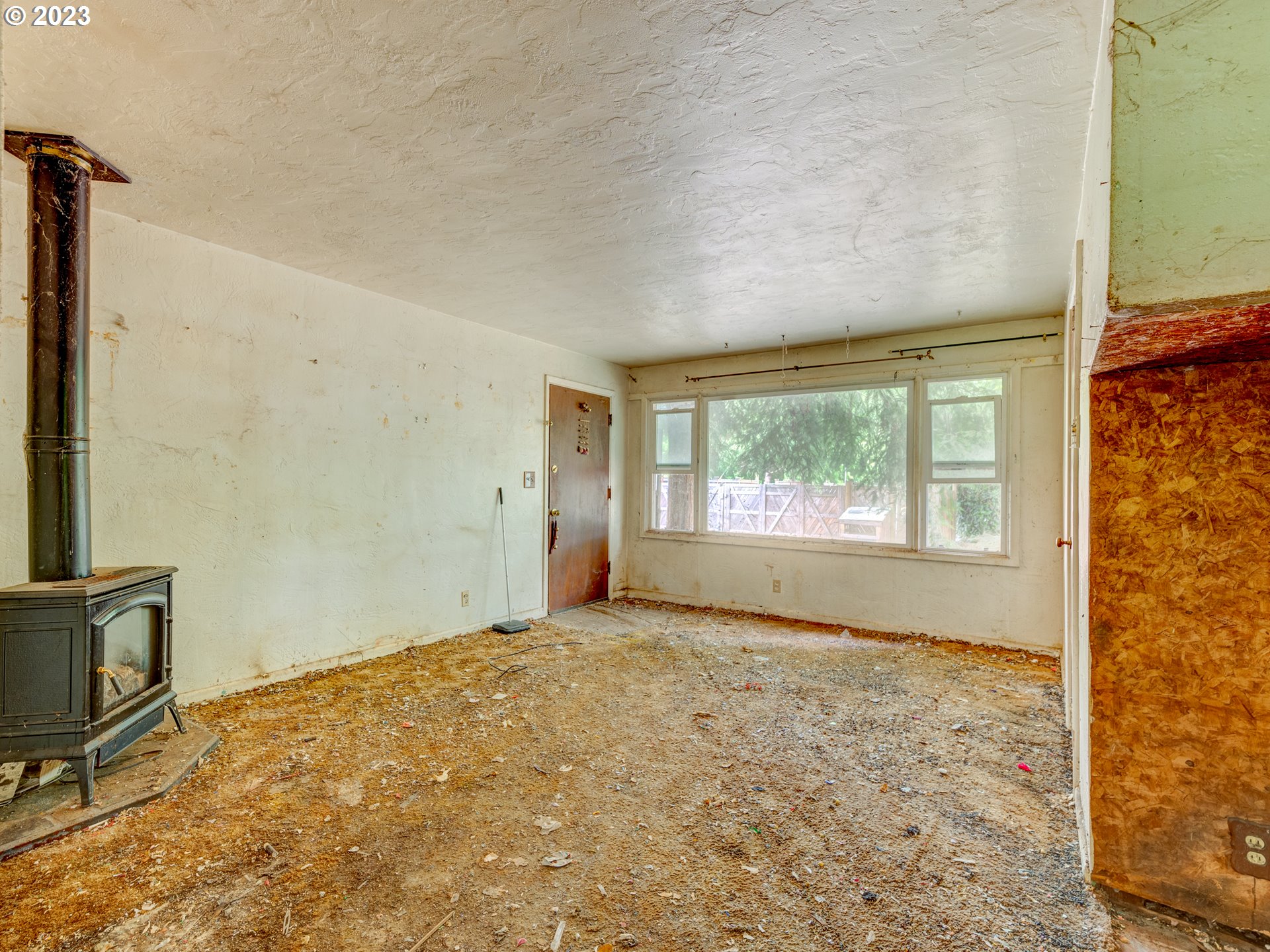 3350 Oriole Street Springfield, OR 97477 - Photo 5 of 15 a view of an empty room with a window