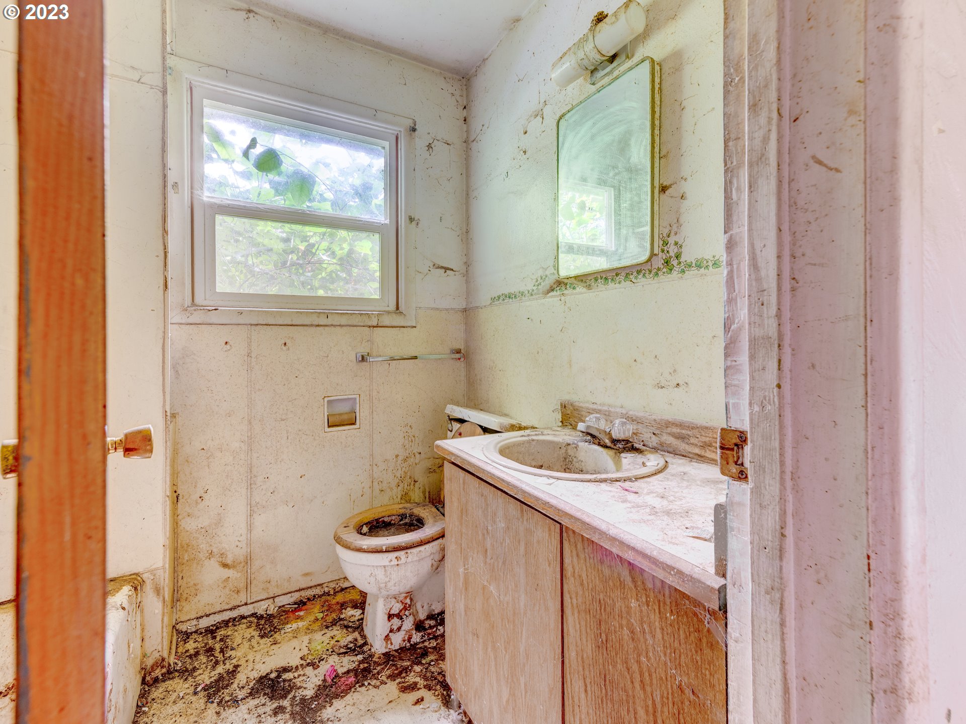 3350 Oriole Street Springfield, OR 97477 - Photo 10 of 15 a bathroom with a granite countertop sink toilet and a mirror