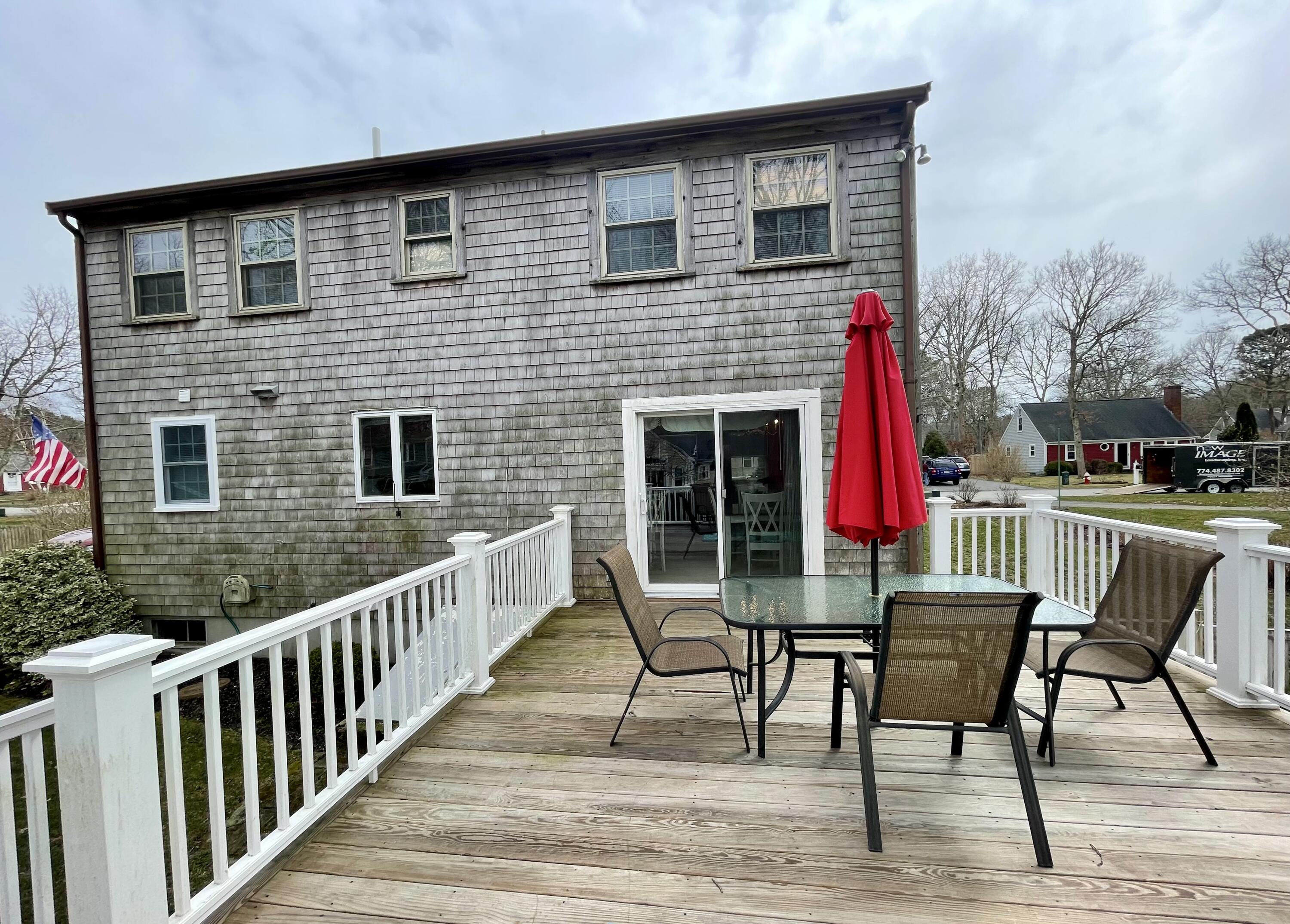 10 Chadwick Road South Dennis, MA 02660 - Photo 8 of 47 back of home.deck