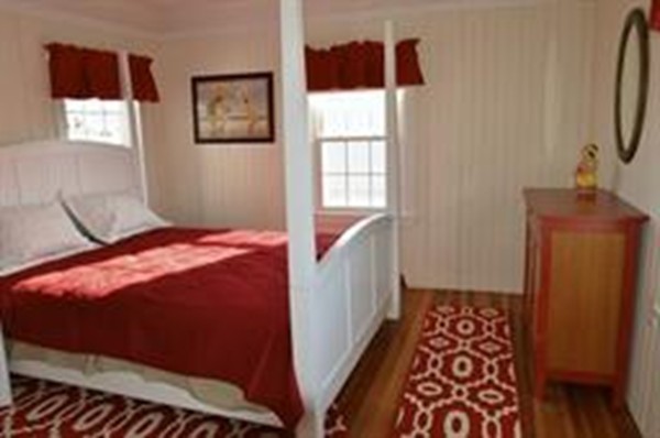 111 Turner Road Scituate, MA 02066 - Photo 11 of 24 a bedroom with a bed and a window