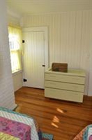 111 Turner Road Scituate, MA 02066 - Photo 14 of 24 a bedroom with a bed and a window