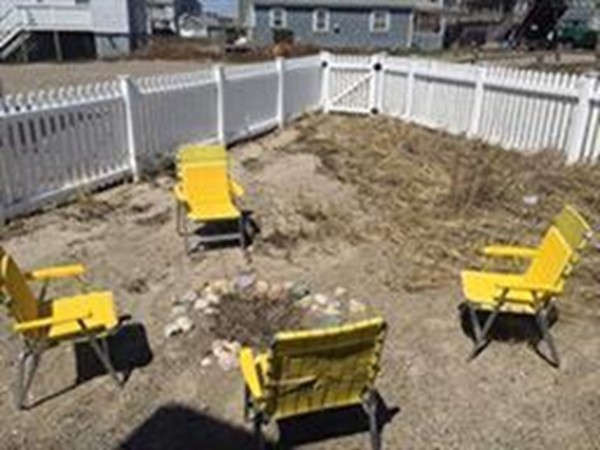 111 Turner Road Scituate, MA 02066 - Photo 4 of 24 a view of a swimming pool with a lounge chairs