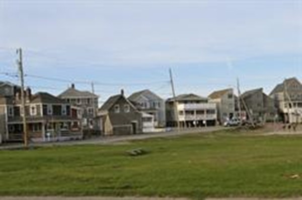 111 Turner Road Scituate, MA 02066 - Photo 5 of 24 a front view of a building with garden