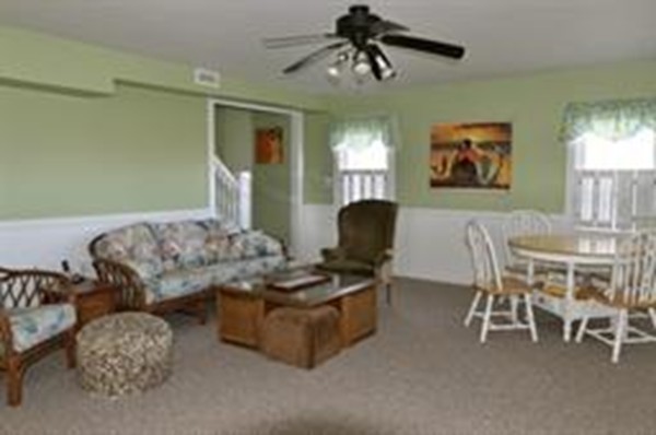 111 Turner Road Scituate, MA 02066 - Photo 7 of 24 a living room with furniture and a window