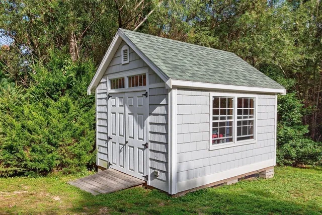 a house view with a garden space