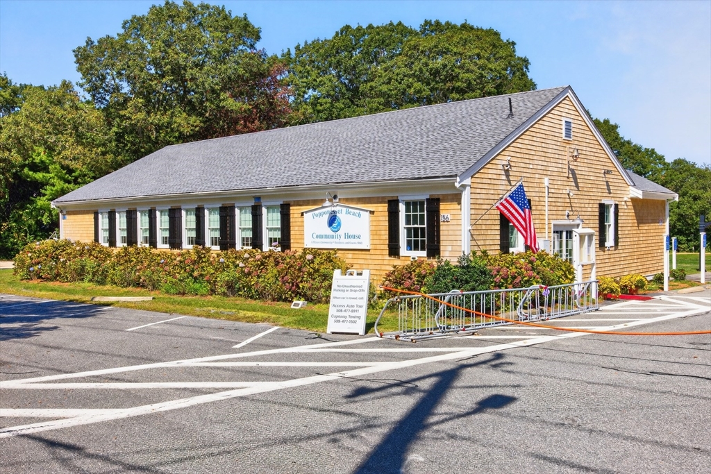 128 Uncle Percy's Road Mashpee, MA 02649 - Photo 40 of 42 a view of a house with a yard and plants