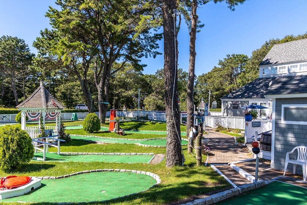 128 Uncle Percy's Road Mashpee, MA 02649 - Photo 42 of 42 a childrens park with lots of swings and slides