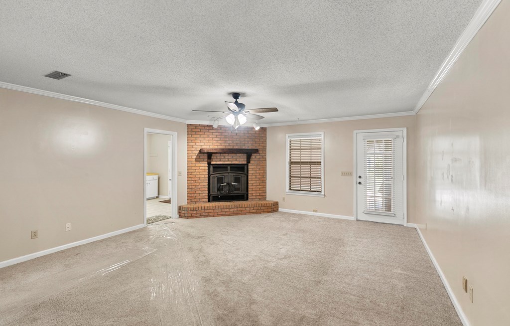108 Prentice Court Dothan, AL 36305 - Photo 4 of 38 Living Room with Wood Burning Fireplace