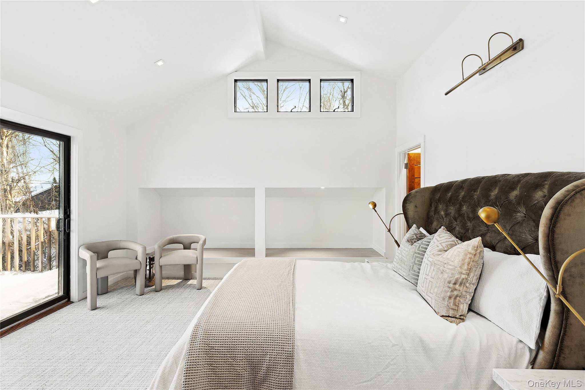 221 Redwood Road Sag Harbor, NY 11963 - Photo 17 of 19 a bedroom with furniture and a large window