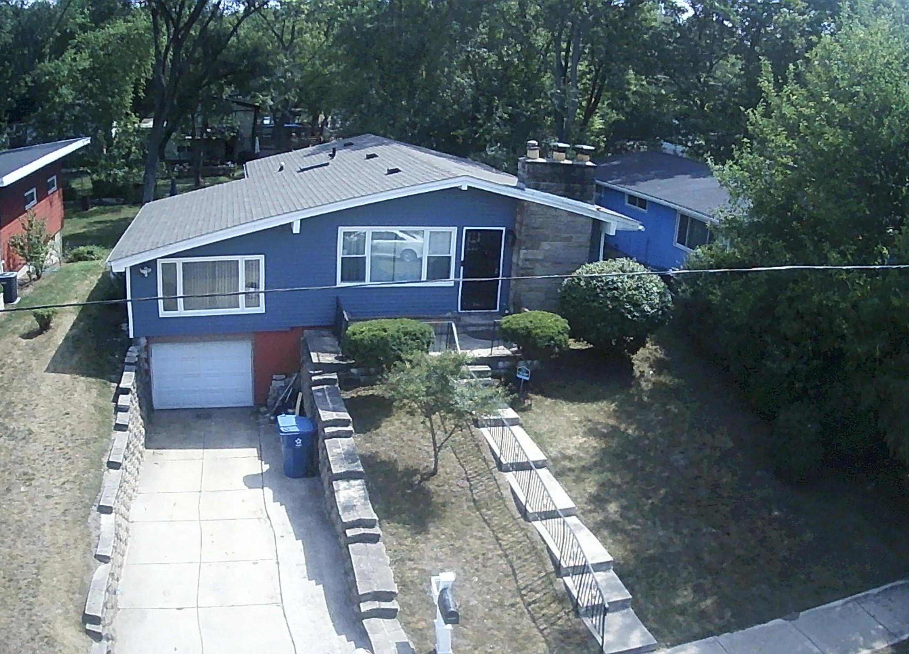 7809 Indian Boundary Gary, IN 46403 - Photo 12 of 13 a front view of a house with garden