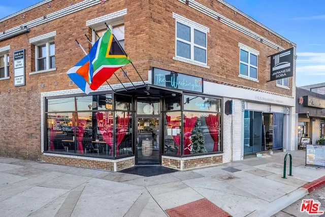 a view of street with shops