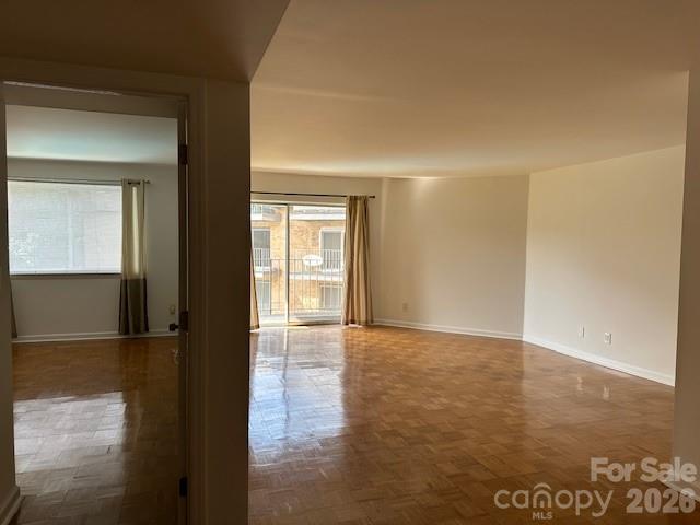 1323 Queens Road, Unit 313 Charlotte, NC 28207 - Photo 28 of 43 a view of an empty room and window