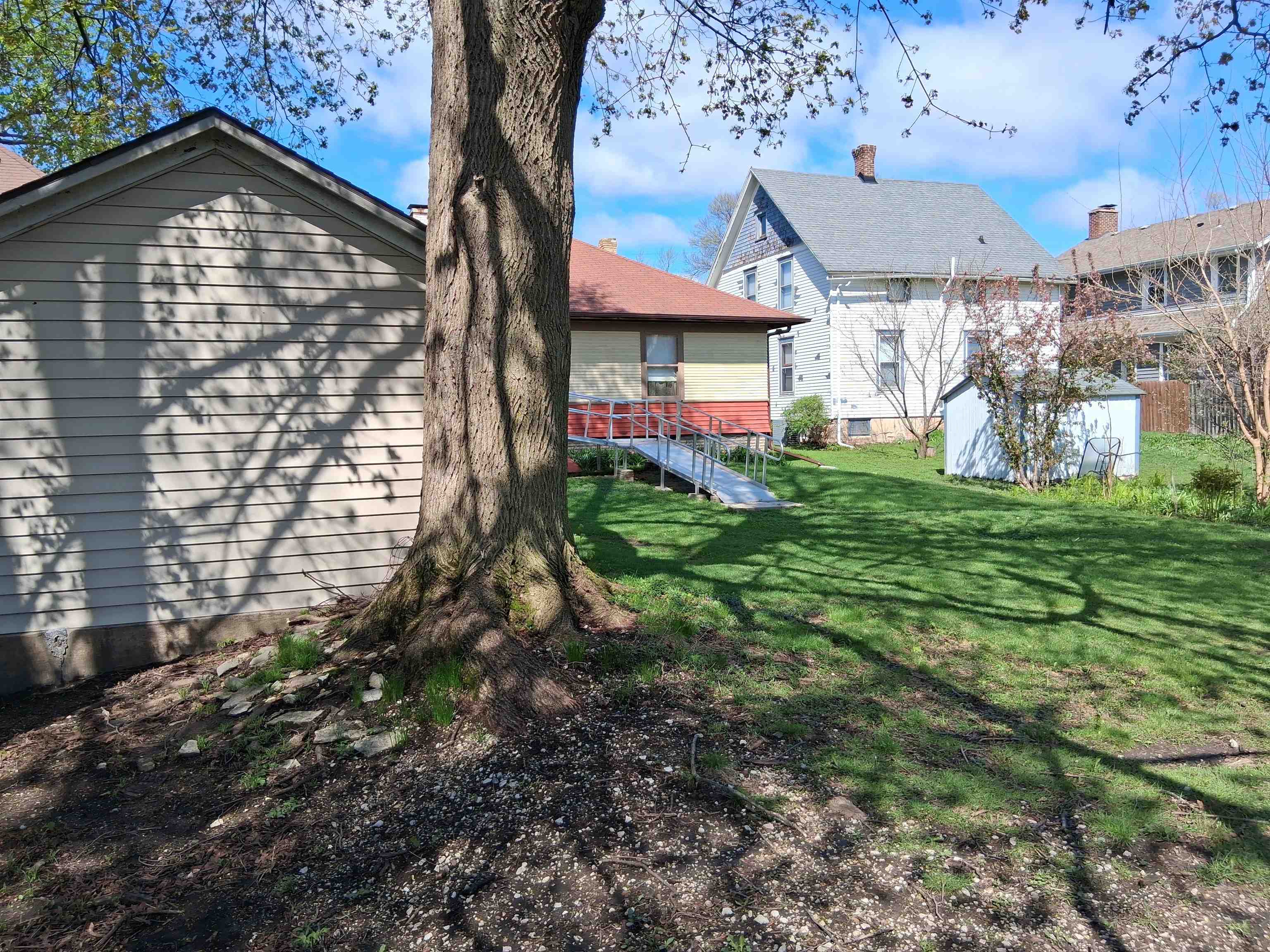 906 Somonauk Street Sycamore, IL 60178 - Photo 42 of 57 a view of a house with a yard