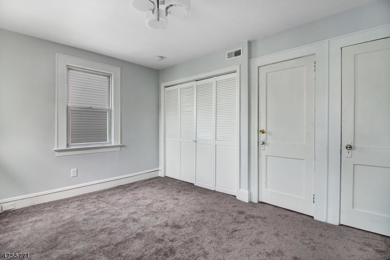 17 William Street, Unit B Summit, NJ 07901 - Photo 11 of 19 a view of an empty room with a window