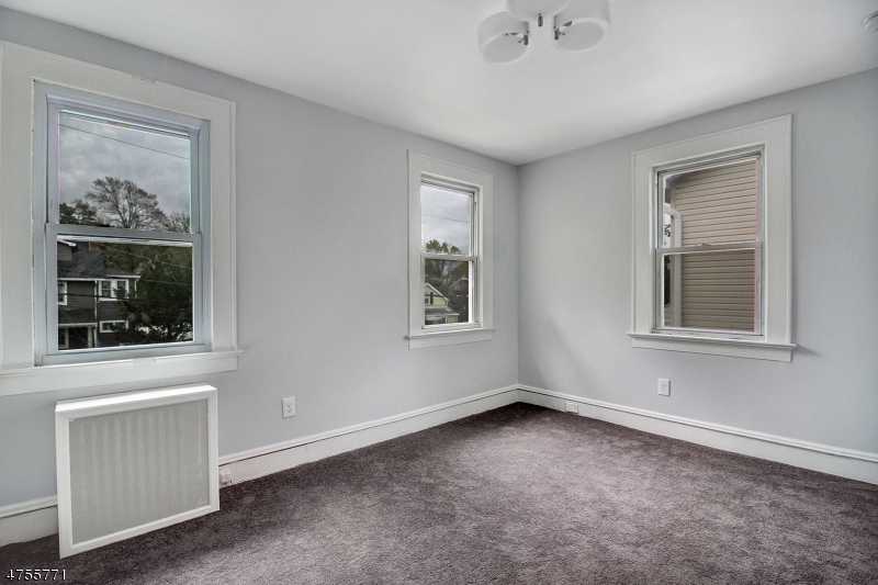 17 William Street, Unit B Summit, NJ 07901 - Photo 12 of 19 a view of an empty room with a window