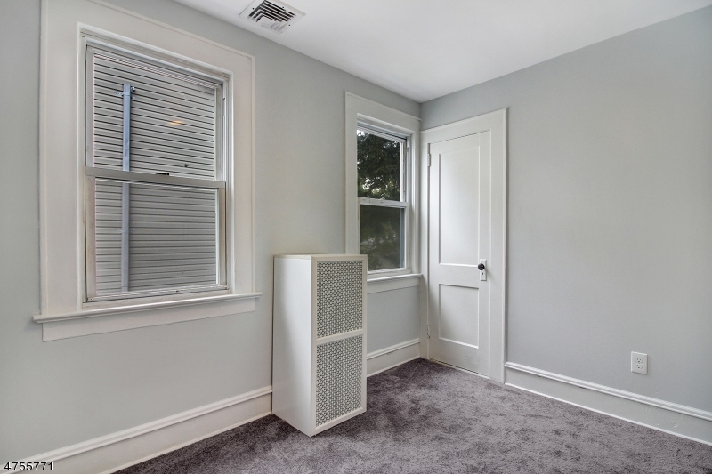 17 William Street, Unit B Summit, NJ 07901 - Photo 13 of 19 a view of an empty room with closet and a window