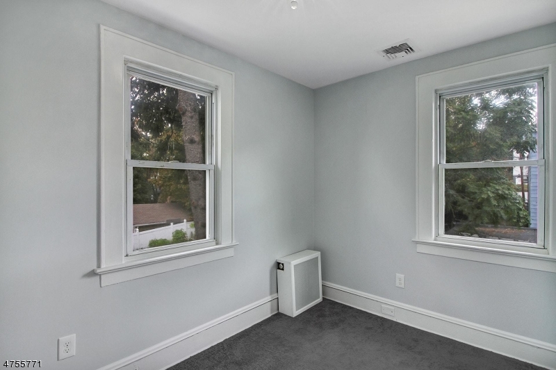 17 William Street, Unit B Summit, NJ 07901 - Photo 14 of 19 a view of room with window and hallway