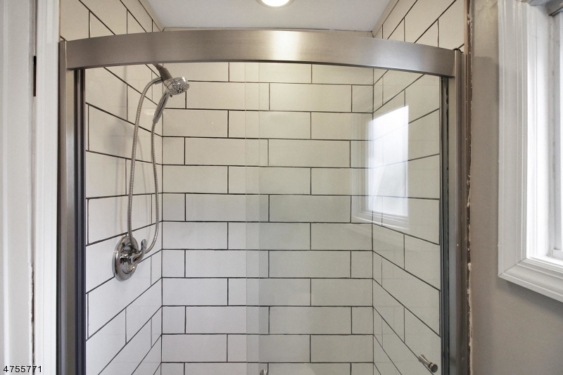 17 William Street, Unit B Summit, NJ 07901 - Photo 17 of 19 a bathroom with a shower