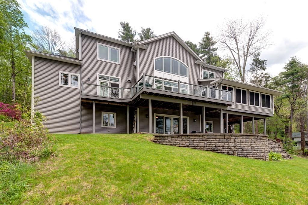 286 Big Alum Road Sturbridge, MA 01518 - Photo 1 of 42 a front view of a house with garden
