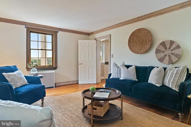 a view of room with window and cabinet