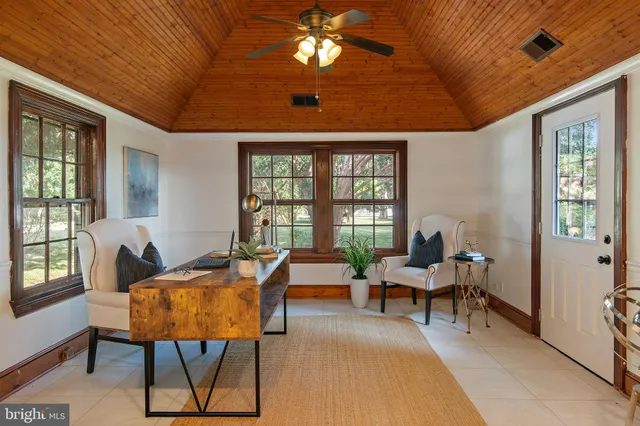 a kitchen with appliances cabinets and a window