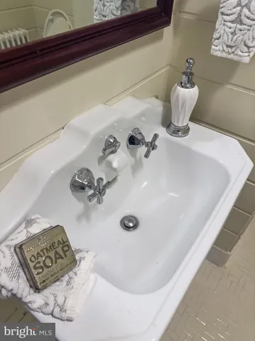 a view of pool with a yard