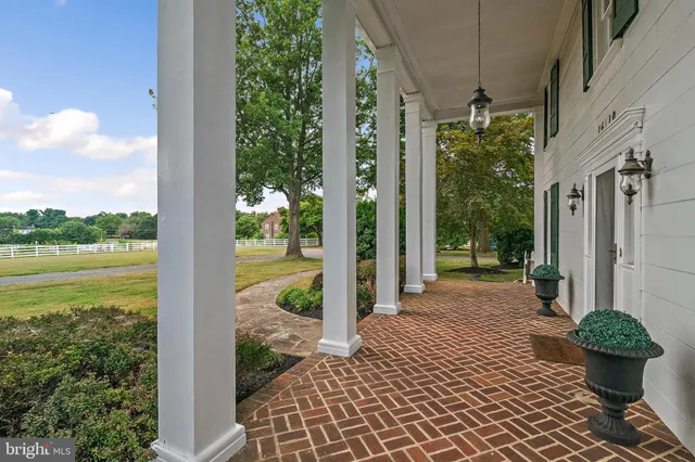 swimming pool with outdoor seating and yard