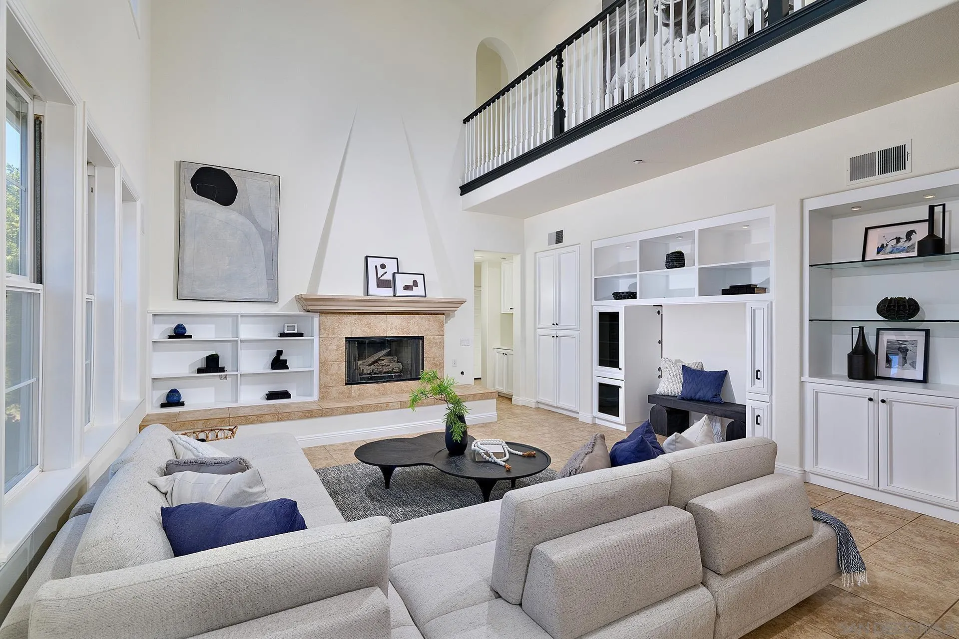 1664 Aryana Drive Encinitas, CA 92024 - Photo 11 of 38 a living room with furniture and a fireplace