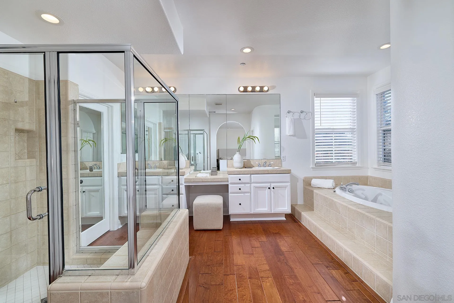 1664 Aryana Drive Encinitas, CA 92024 - Photo 16 of 38 a large spacious bathroom with a granite countertop tub shower double vanity and a mirror