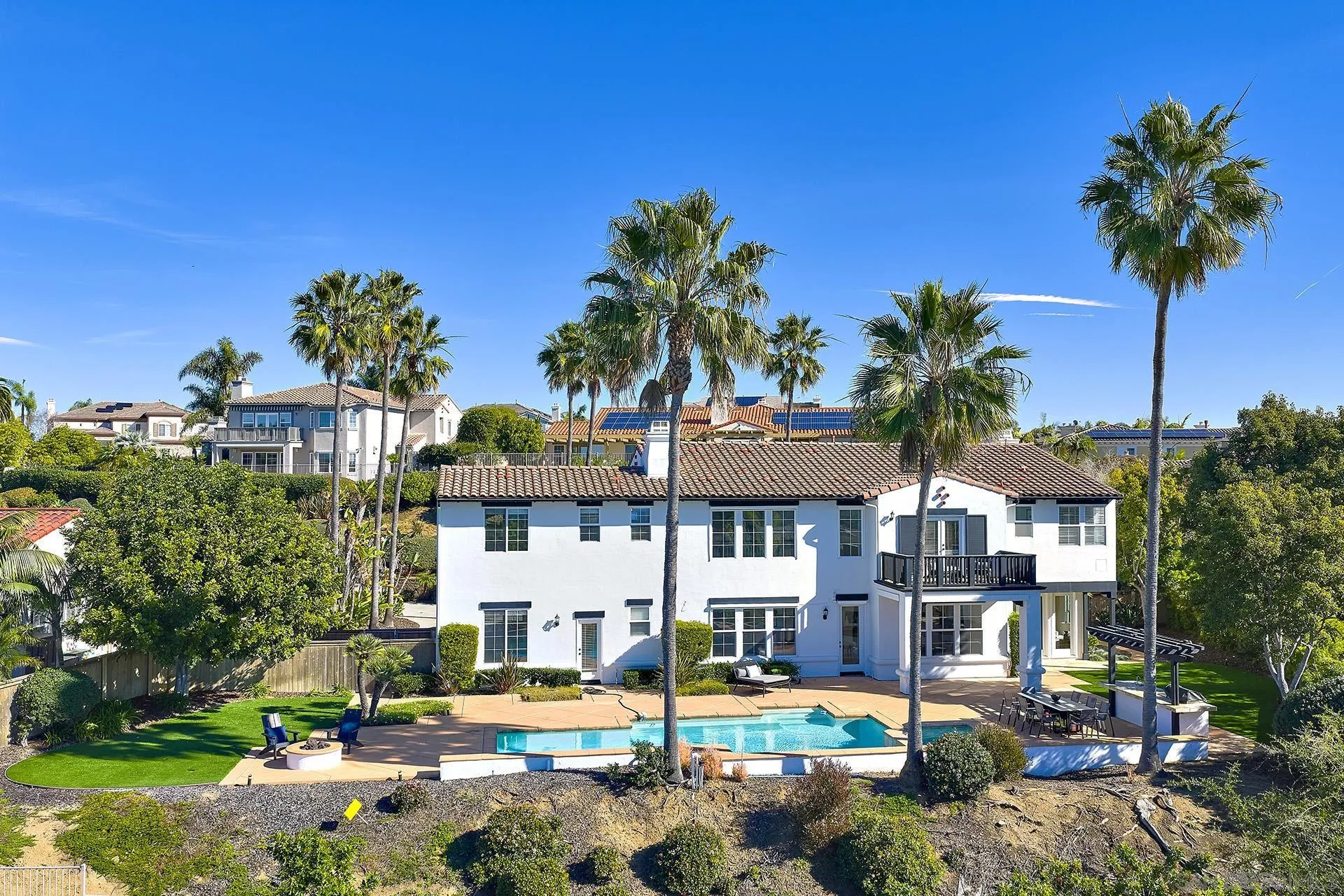 1664 Aryana Drive Encinitas, CA 92024 - Photo 28 of 38 a front view of a building with garden