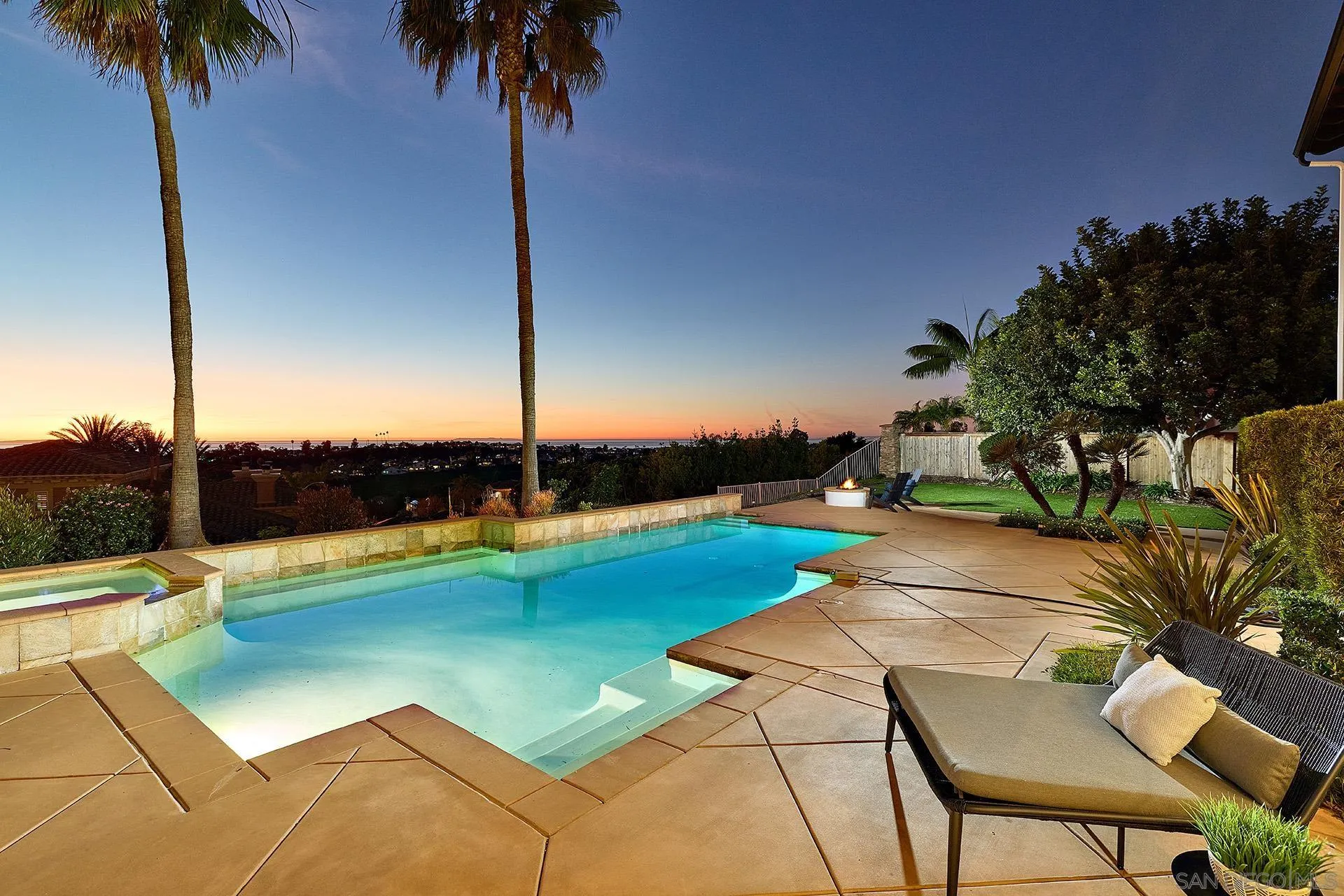 1664 Aryana Drive Encinitas, CA 92024 - Photo 31 of 38 a view of swimming pool with a table and chairs