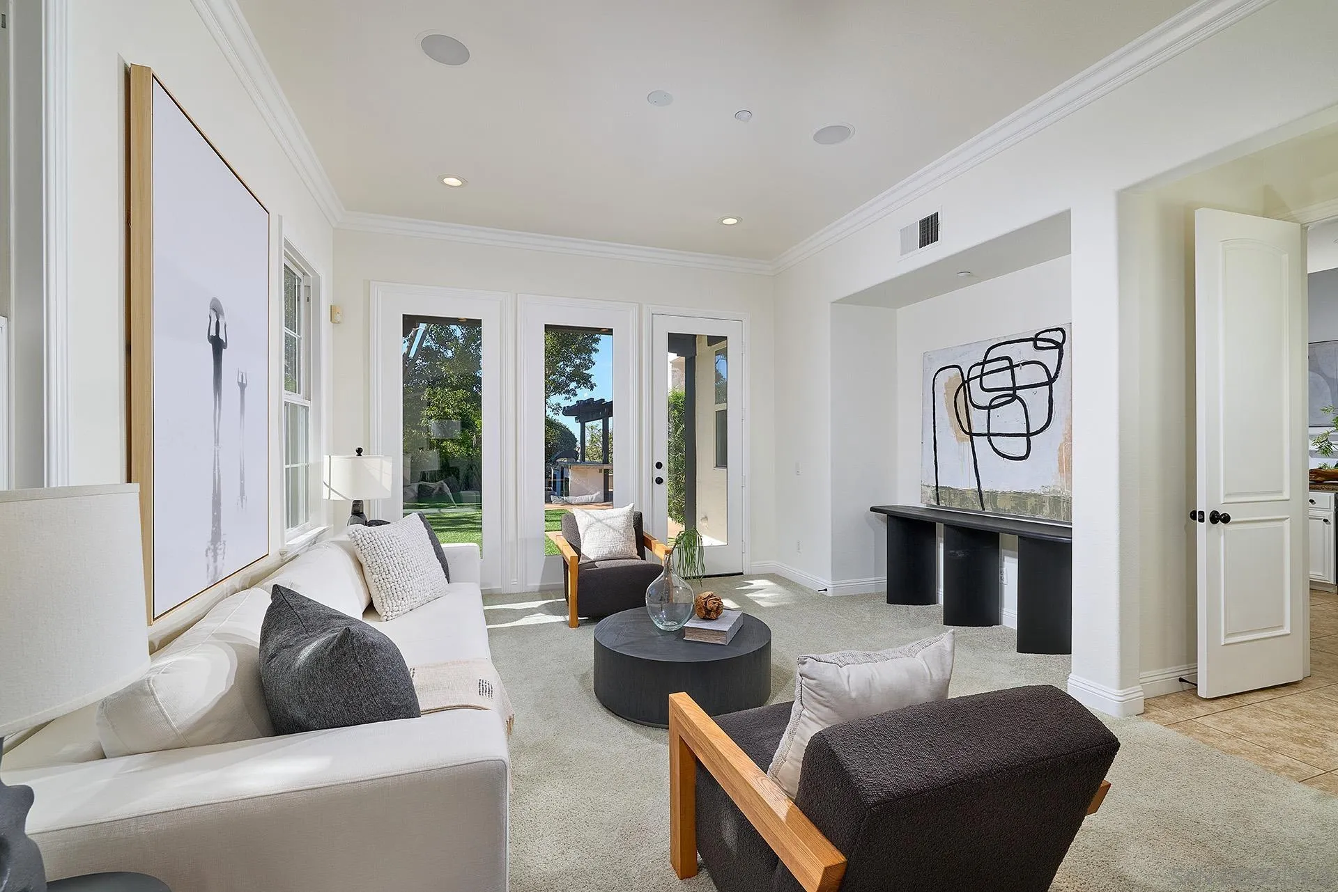 1664 Aryana Drive Encinitas, CA 92024 - Photo 6 of 38 a living room with furniture and a fireplace