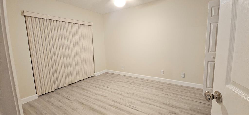 814 Northwest 79th Terrace, Unit 814 Plantation, FL 33324 - Photo 12 of 21 a view of a small space with wooden floor
