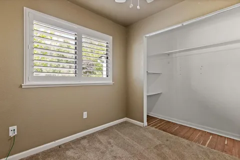 a bathroom with a sink a mirror and a vanity