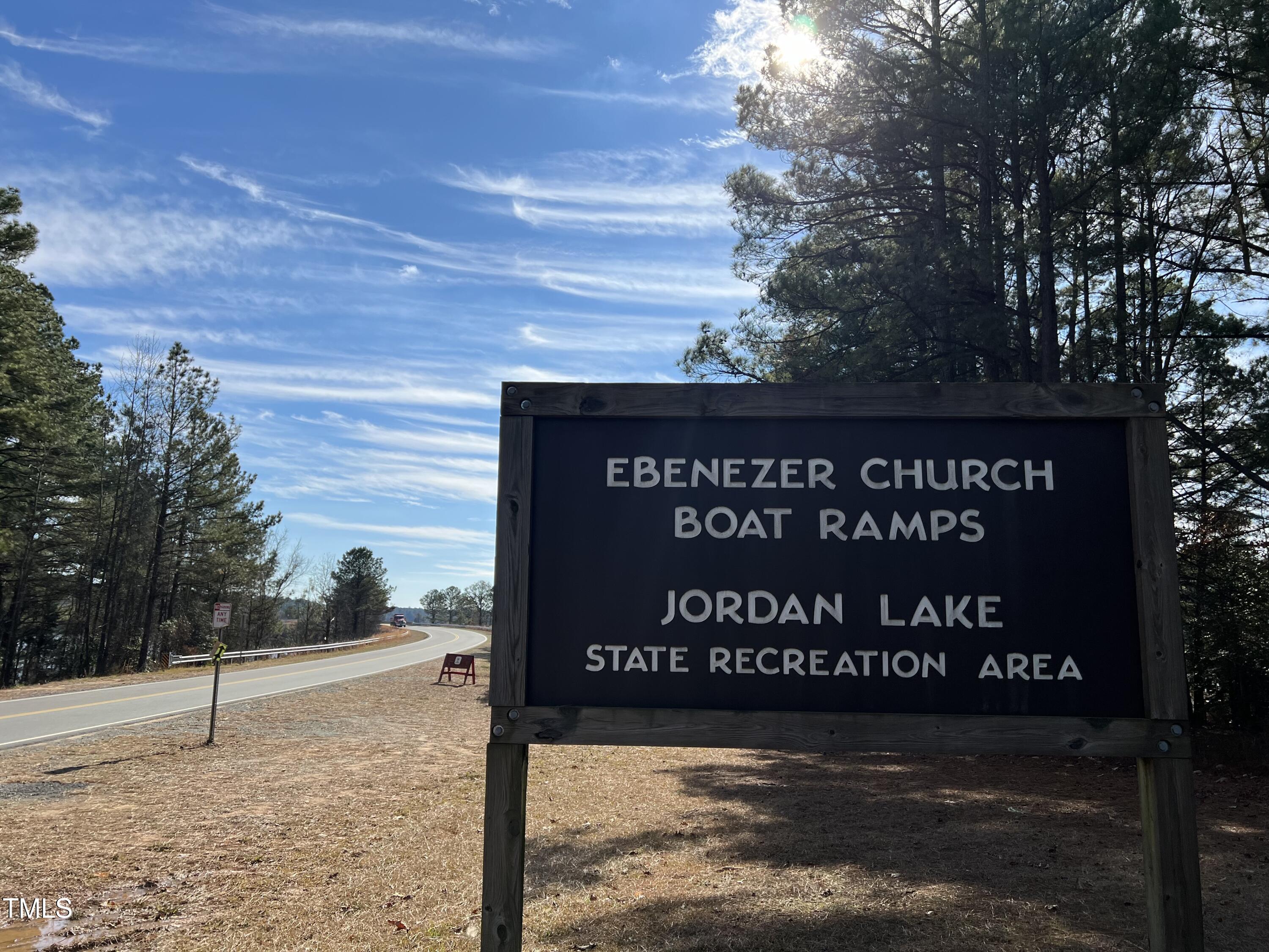 102 Anfield Road New Hill, NC 27562 - Photo 13 of 19 a sign on the side of a building