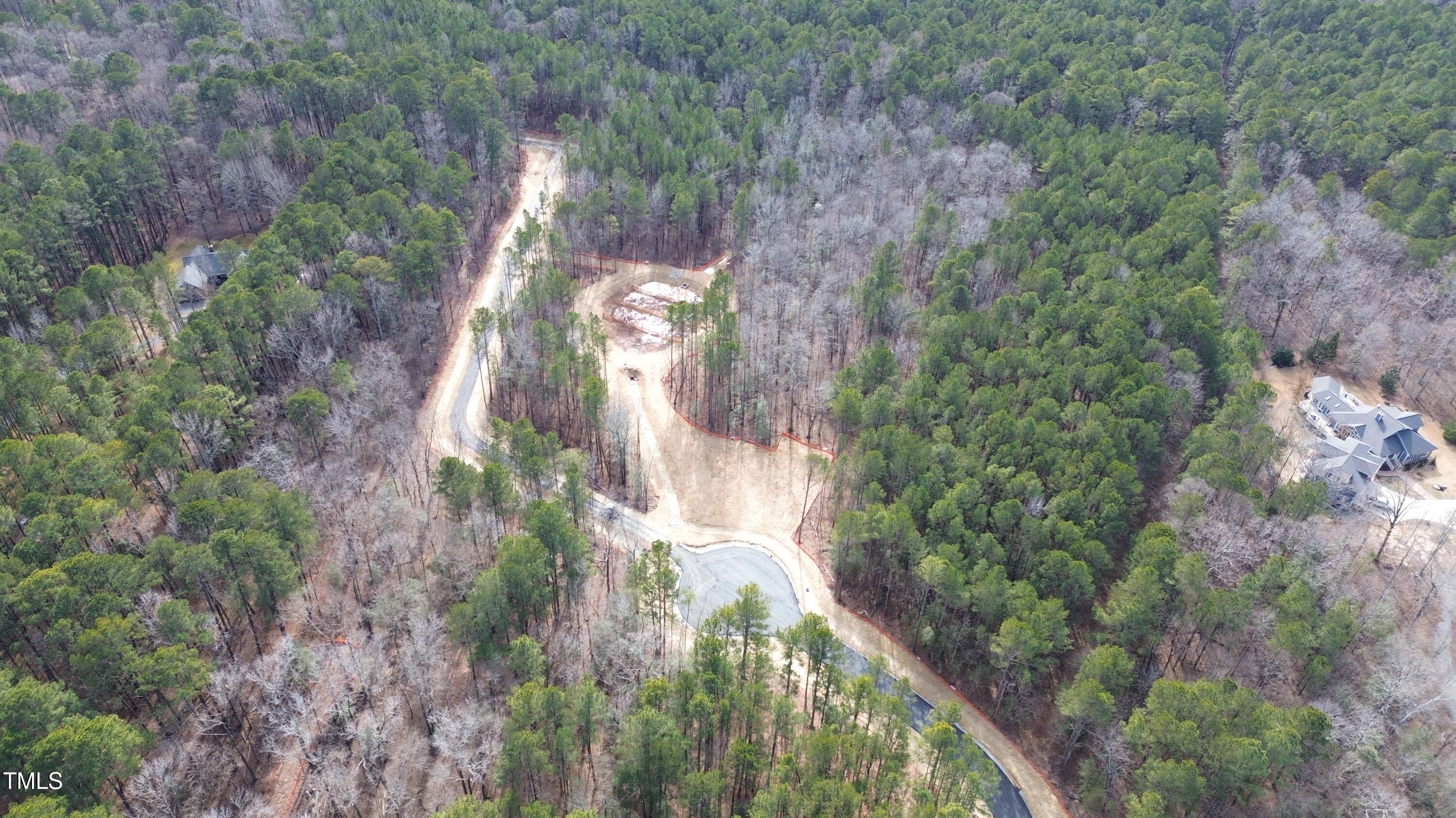 102 Anfield Road New Hill, NC 27562 - Photo 8 of 19 a backyard of a house with a yard and large trees