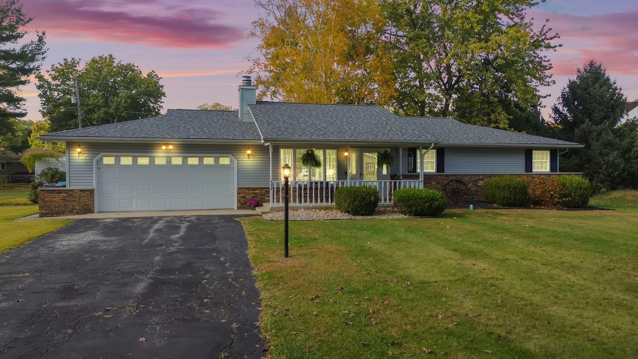 602 Forsythia Street Southeast De Motte, IN 46310 - Photo 2 of 16 a view of backyard of the house