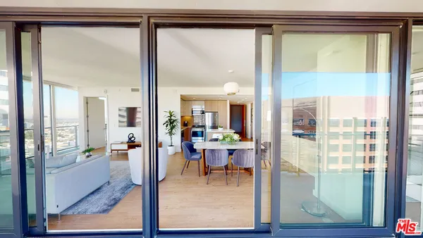 a dining room with large window