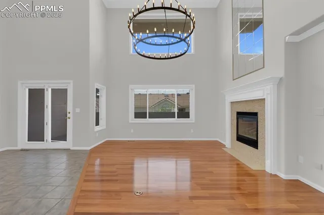 a front view of a house with a large window
