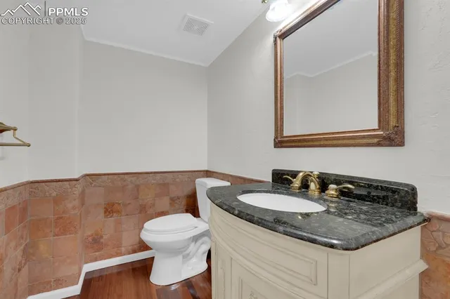 a view of a kitchen with cabinets