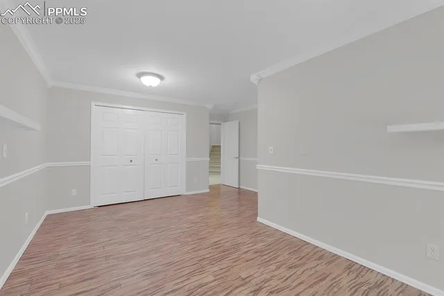 a front view of a house with a yard and a garage