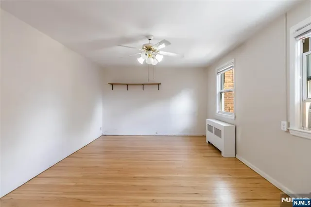 a bathroom with a sink a mirror and a shower