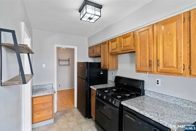 a view of walk in closet with window