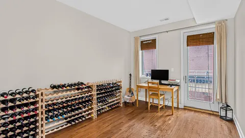 a bedroom with furniture and a window