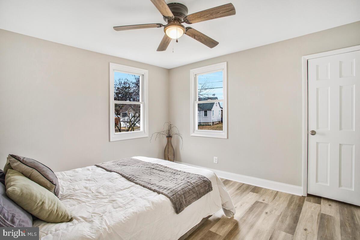 71 Del Rio Road Dundalk, MD 21222 - Photo 12 of 37 a bedroom with a bed and a window