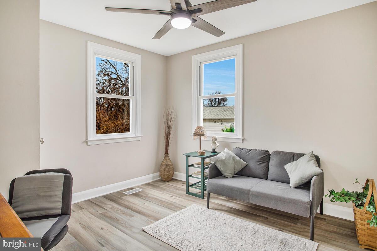 71 Del Rio Road Dundalk, MD 21222 - Photo 15 of 37 a living room with furniture and a window