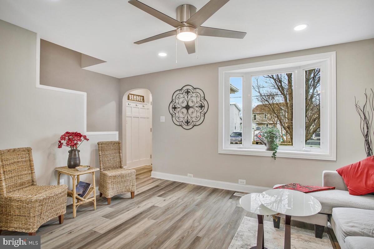 71 Del Rio Road Dundalk, MD 21222 - Photo 6 of 37 a living room with furniture and a large window