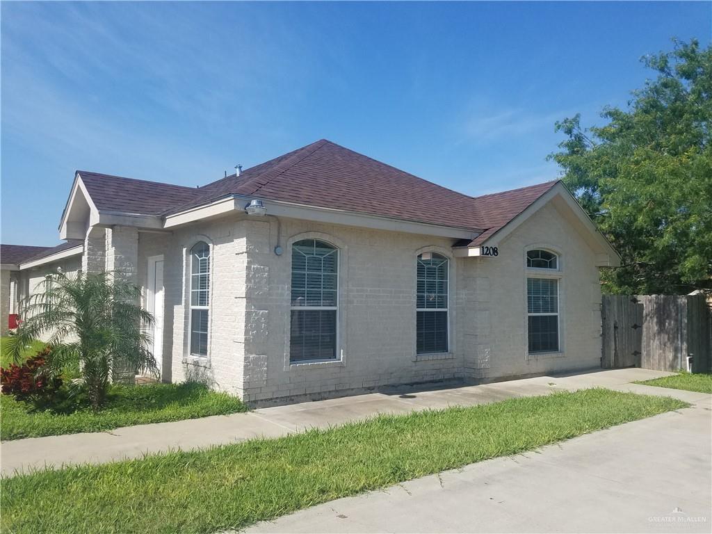 1208 West Wisconsin Road, Unit C Edinburg, TX 78539 - Photo 14 of 16 front view of house with a yard
