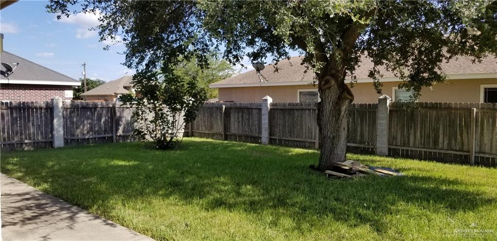 1208 West Wisconsin Road, Unit C Edinburg, TX 78539 - Photo 15 of 16 a view of a backyard with a tree