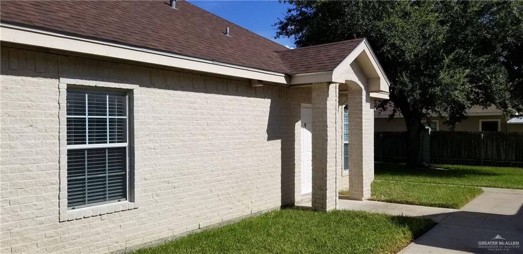 1208 West Wisconsin Road, Unit C Edinburg, TX 78539 - Photo 16 of 16 a front view of a house with a yard